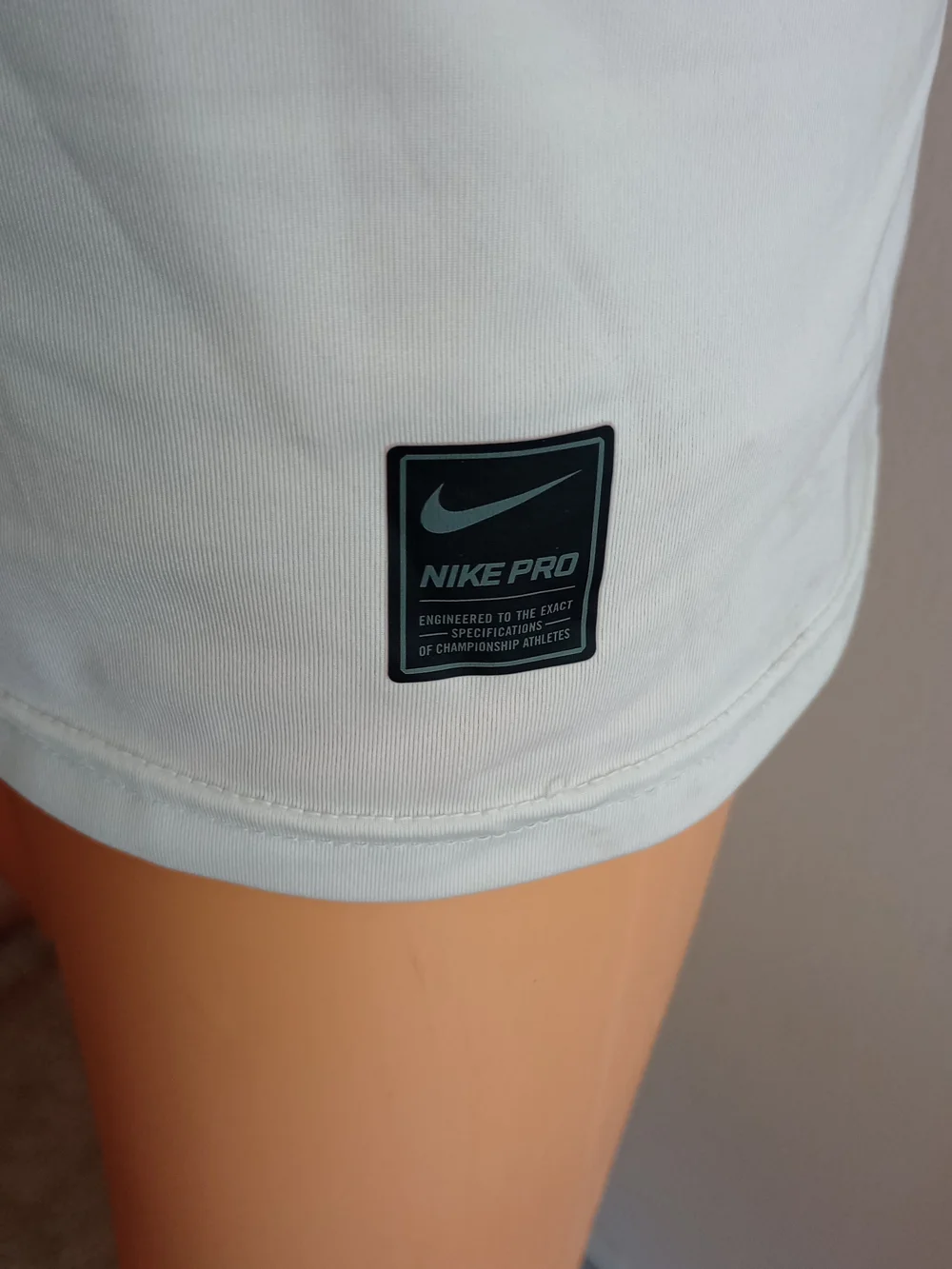 Nike White Athletic Tank Top with Black Swoosh